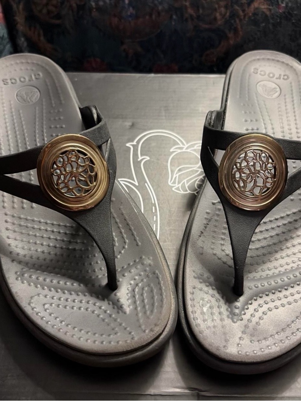 CROCS Women's Black Thong Sandals with Gold Decorative Medallions